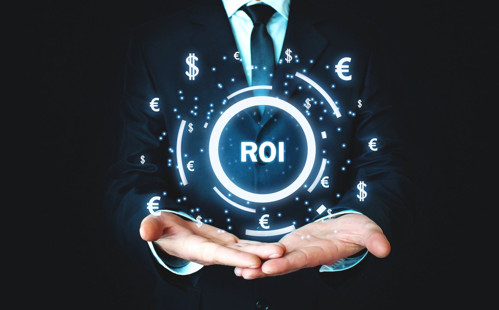 business man holding digital ROI sign - What Does ROI Stand For: Arcane Marketing