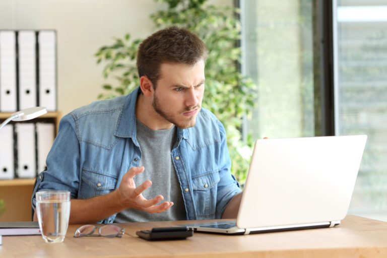 Man Angry At Computer