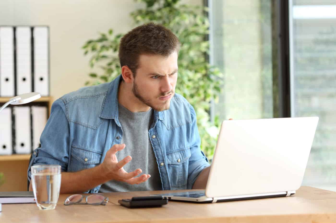 Man Angry At Computer